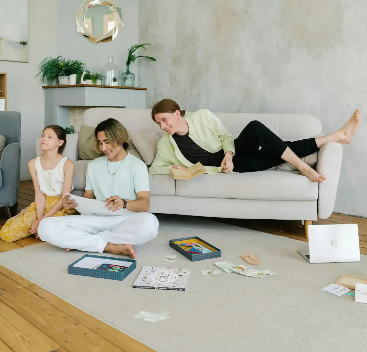 Family enjoying board games together in a modern living room setting.