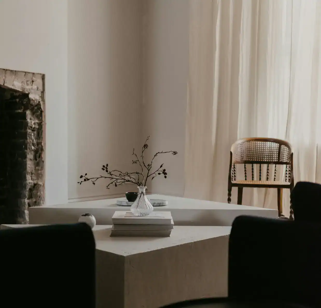 Elegant interior design featuring a cozy seating area and decorative accents.