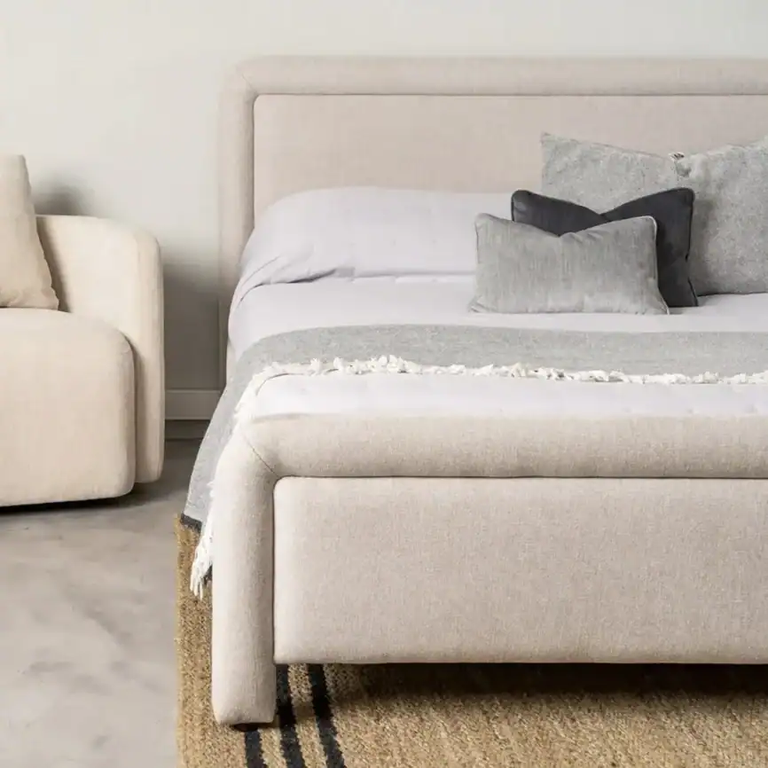 Altea Bed with soft fabric and stylish headboard for contemporary bedrooms.