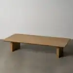 Wooden coffee table with a minimalist design and natural finish.