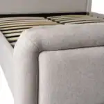Close-up of the upholstered Altea Bed frame with wooden slats.
