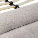 Close-up of the textured fabric upholstery on the Altea bed frame.