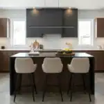 Onda Stool placed at kitchen island with contemporary design.