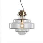 Pendant lamp with glass and brass accents for modern interiors.
