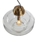 Modern glass pendant lamp with brass fixture for stylish lighting.