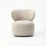 Modern beige Turis armchair with plush upholstery and rounded design.