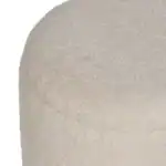 Close-up of Anna Puffs cushion with textured beige fabric.