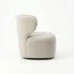 Elegant Turis armchair in soft beige fabric, modern design for stylish living spaces.