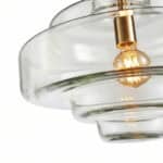 Elegant glass pendant lamp with warm lighting.