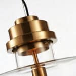 Elegant gold art pendant lamp for stylish interior lighting.