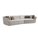 Alcora sofa with plush cushions, perfect for contemporary living spaces. Comfortable, stylish, and d.