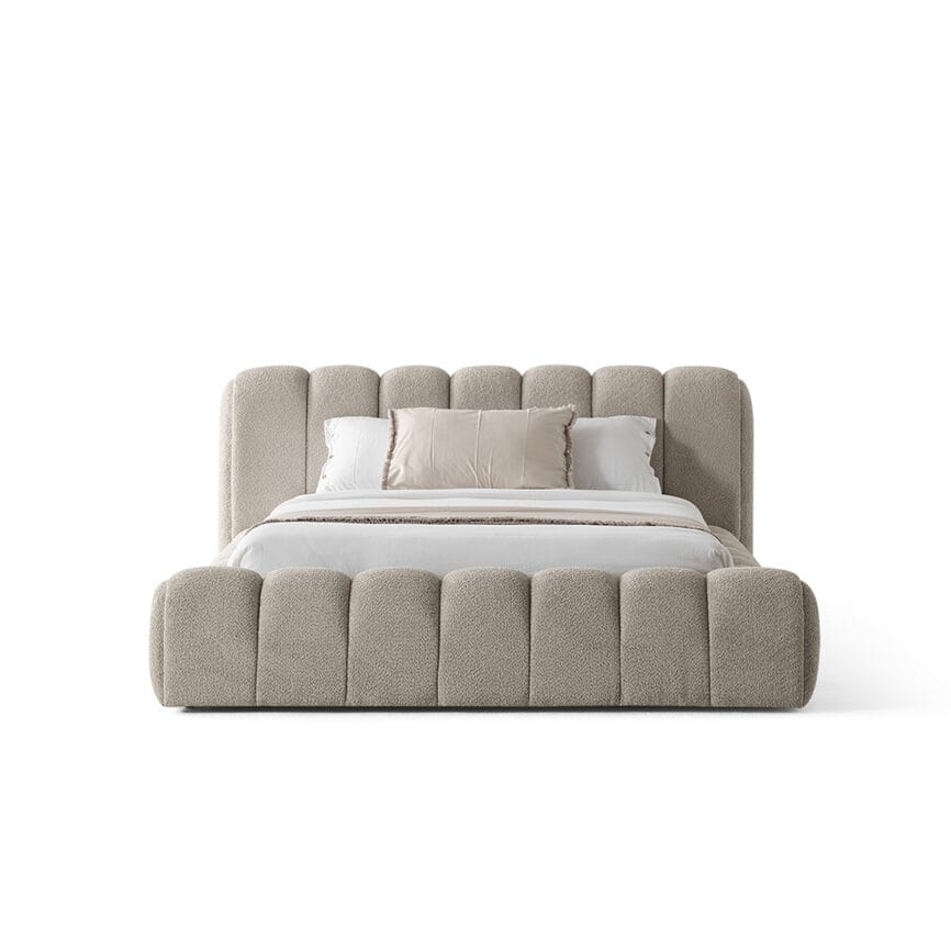 Elegant Carlet Bed with plush, padded headboard and footboard in neutral tones.