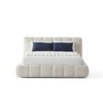 Modern Novelda Bed with upholstered headboard and plush design.