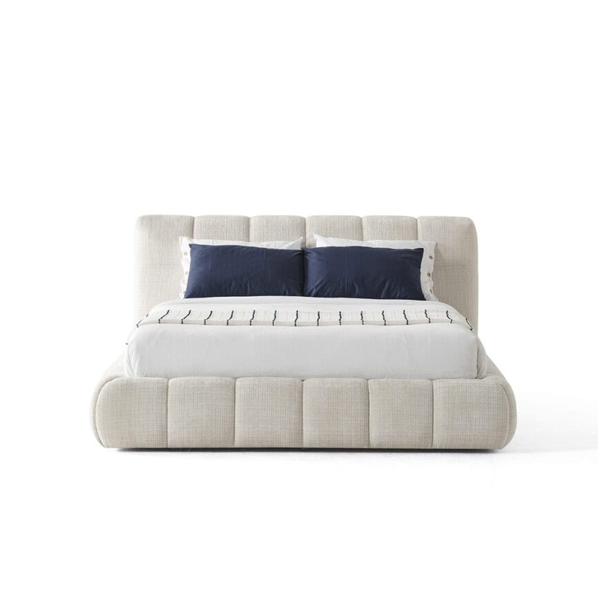 Modern Novelda Bed with upholstered headboard and plush design.