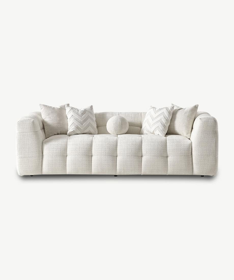 Elegant Oropesa sofa with plush cushions and neutral tones for modern living rooms.