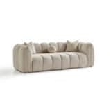 Elegant beige Vallada sofa with plush cushions, perfect for modern living rooms.