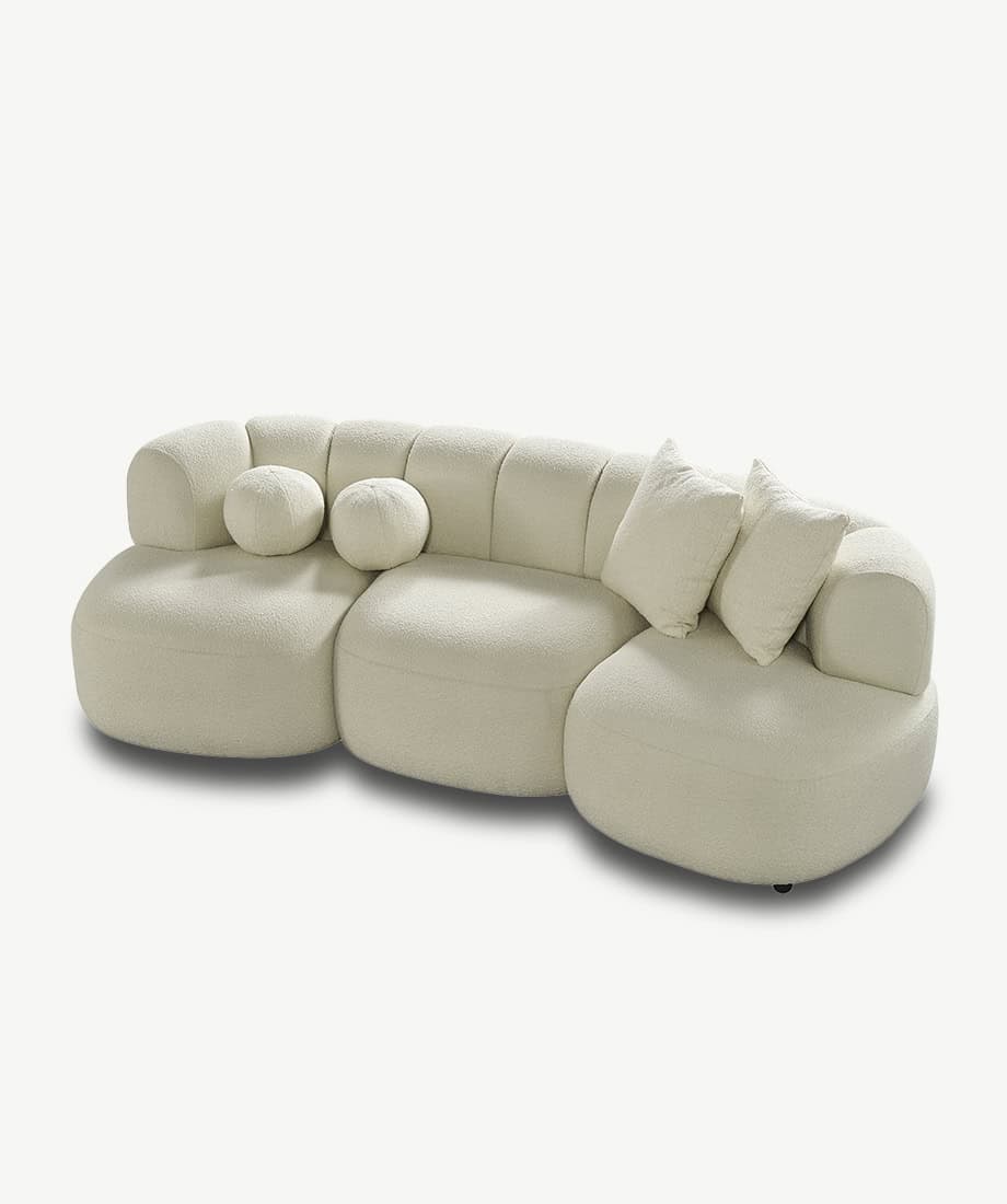 Enguera Sofa - Elegant beige sectional sofa with plush cushions for comfort.