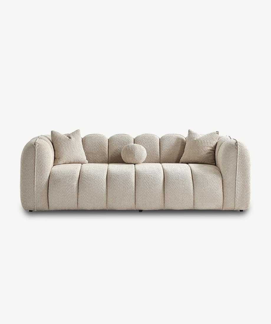 Elegant Vallada sofa with plush cushions and modern design. Perfect for stylish living rooms and con.