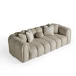 Elegant beige Xera sofa with plush cushions and unique rounded design for stylish living spaces.