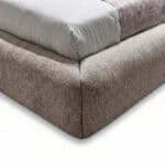 Ayora Bed with upholstered base and comfortable mattress for stylish bedroom decor.