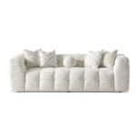 Elegant Oropesa sofa with plush cushions and neutral fabric for modern living rooms.