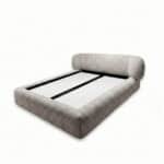 Elegant Ayora Bed with soft fabric upholstery and contemporary design.