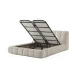 Elegant storage bed with lift-up mattress for bedroom organization and style.