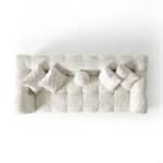 Elegant Oropesa sofa with plush cushions and neutral tones, perfect for contemporary living spaces.