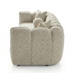 Elegant beige Vallada sofa with plush cushions and rounded armrests. Perfect for modern living rooms.