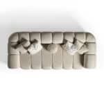 Elegant Xera Sofa with soft fabric upholstery and cozy cushions for contemporary living rooms.