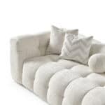 Elegant Oropesa sofa with plush cushions and modern design for stylish living rooms.