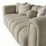 Xera Sofa with textured fabric and plush cushions for contemporary home comfort.