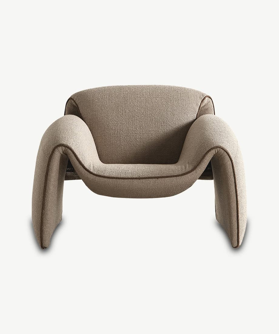 Elegant Forcal Armchair with plush cushioning and unique curved design.
