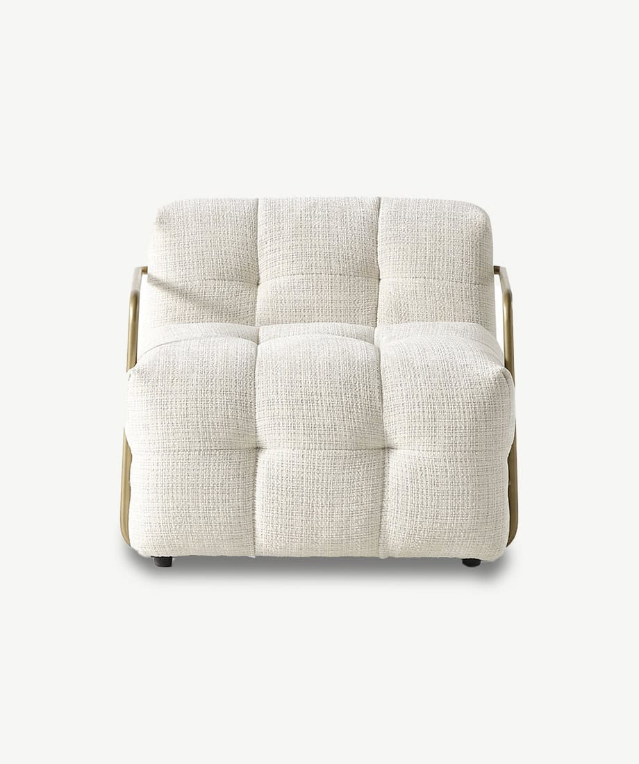 Armchair with plush fabric and modern design for stylish living spaces.