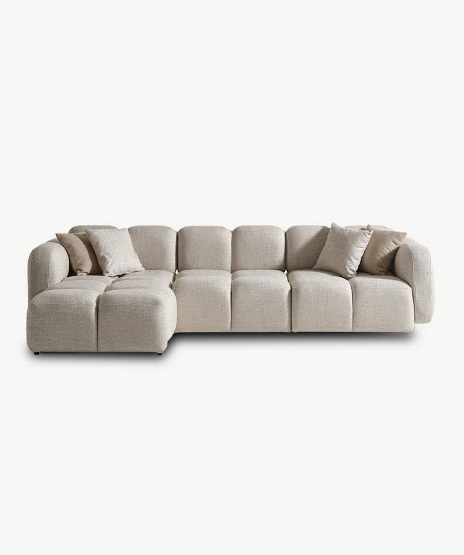 Elegant beige Nules sofa with plush cushions, perfect for modern living rooms.