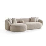 Modern beige Tous sofa with plush cushions and rounded design.