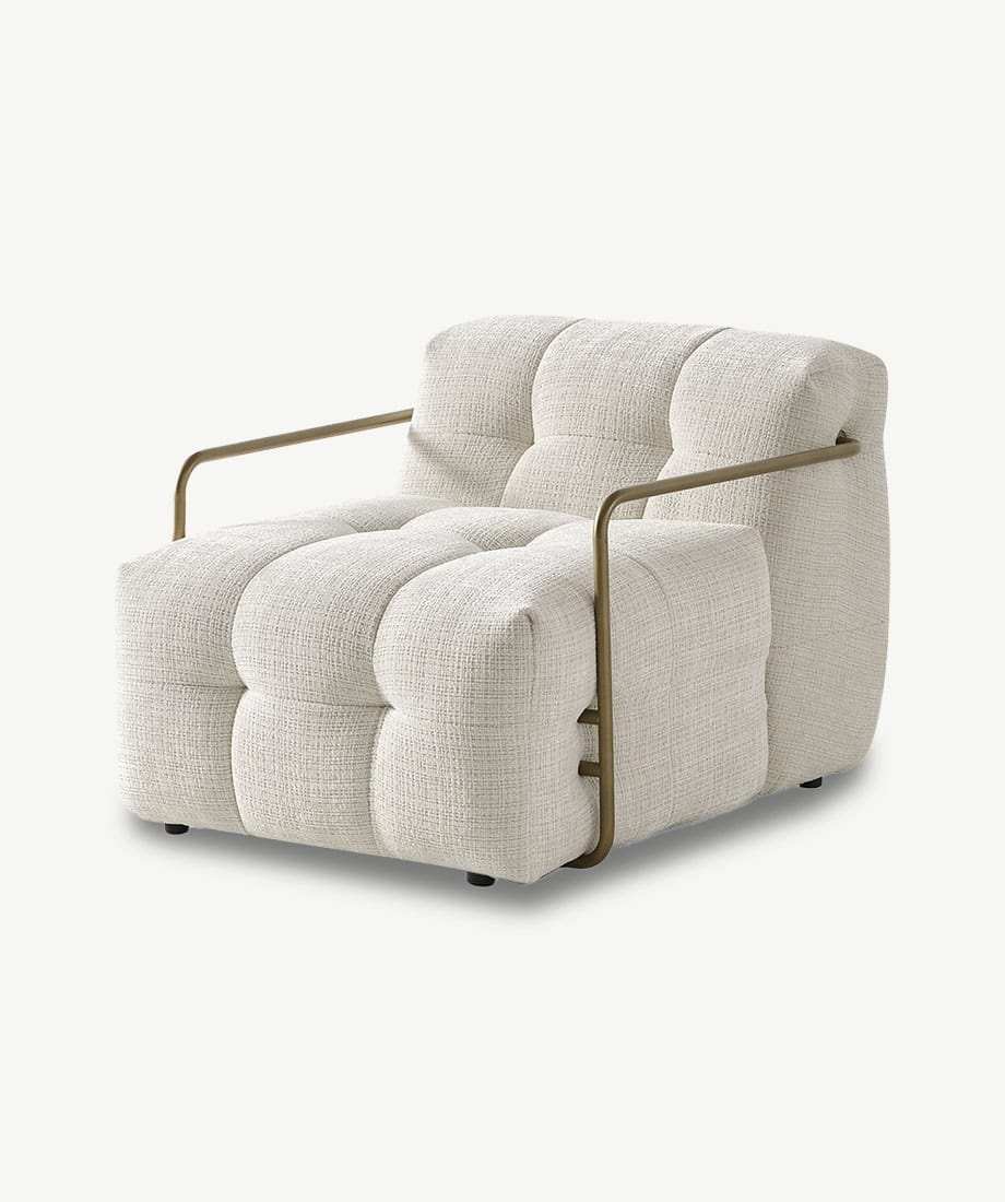 Armchair with plush cushioning and modern design for stylish living spaces.