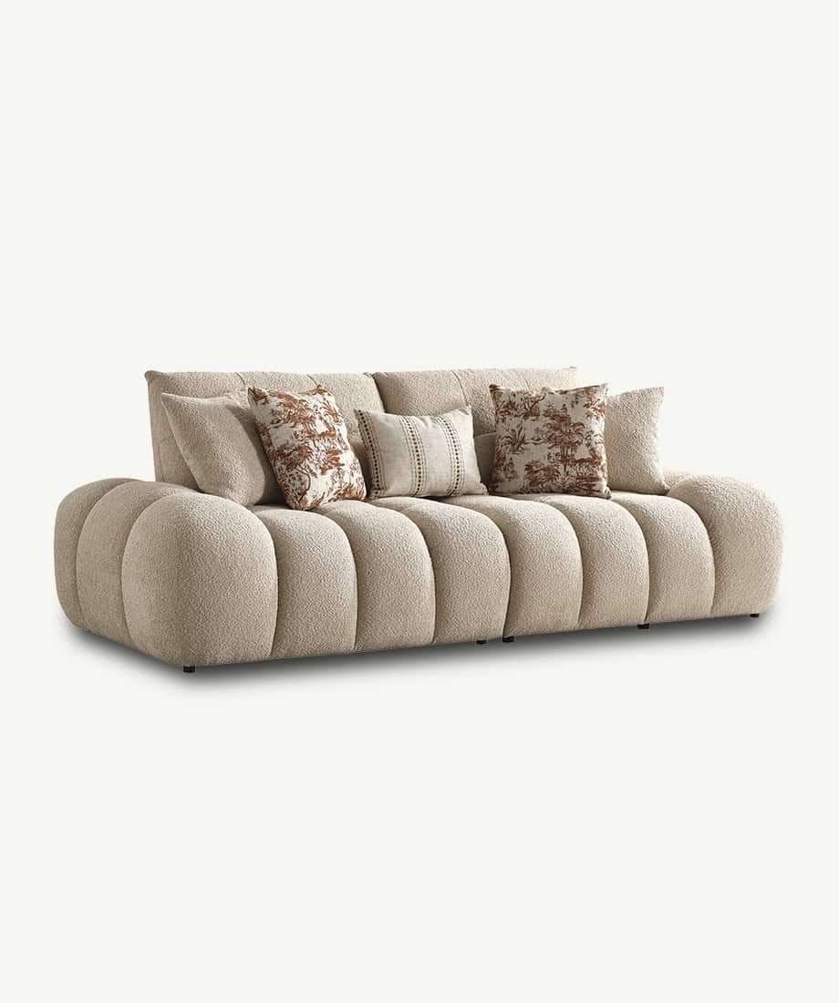 Comfortable beige Jerica sofa with plush cushions and textured pillows.