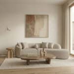 Elegant living room with contemporary furniture and abstract art, perfect for modern home collection.