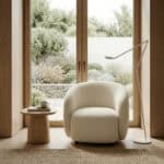 Comfortable Villar armchair with soft upholstery in a minimalist interior setting.