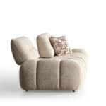 Comfortable beige Jerica sofa with plush cushions and decorative pillow.